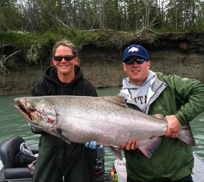 Alaskan Fishing Guide and client with a Kenai River King Salmon